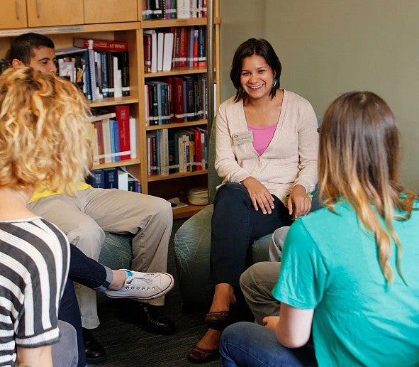 Students attending a group counseling session.