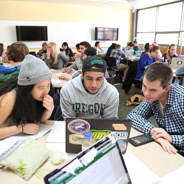 students collaborating in class